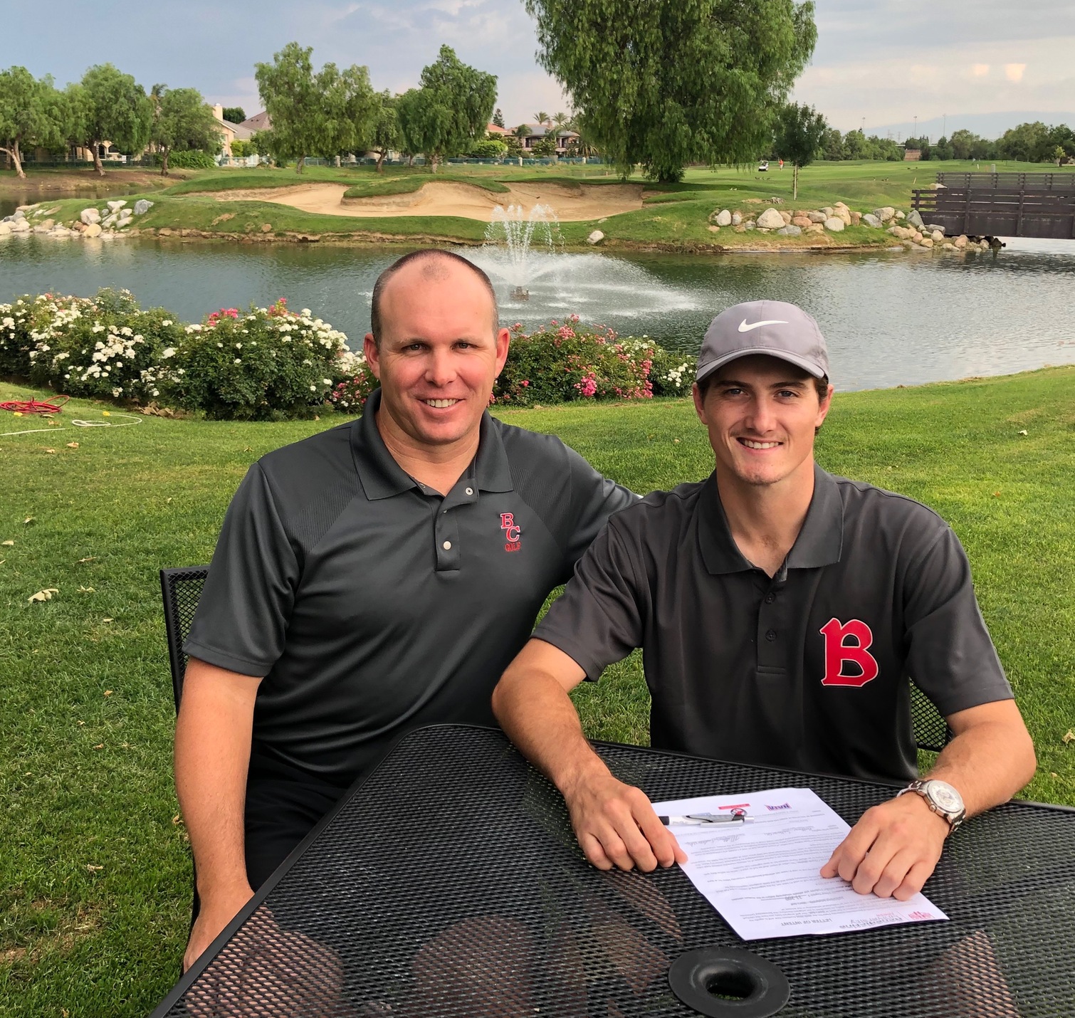 Matt Sakowski with Head Coach Wes Coble, just after signing.